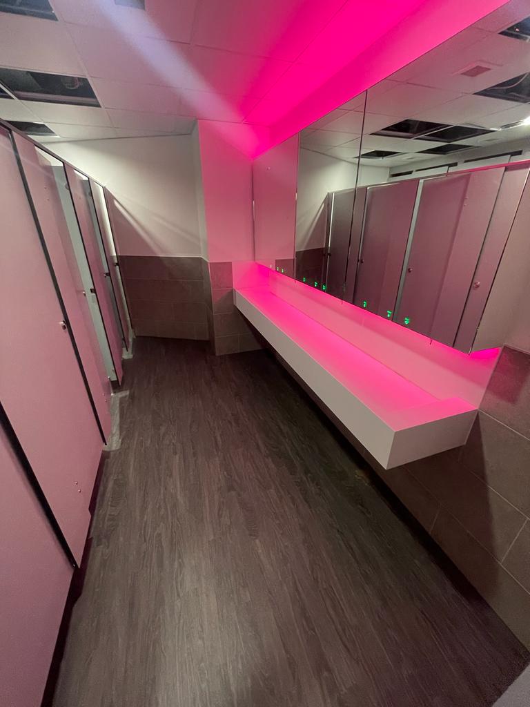 Bathroom with pink LED lighting