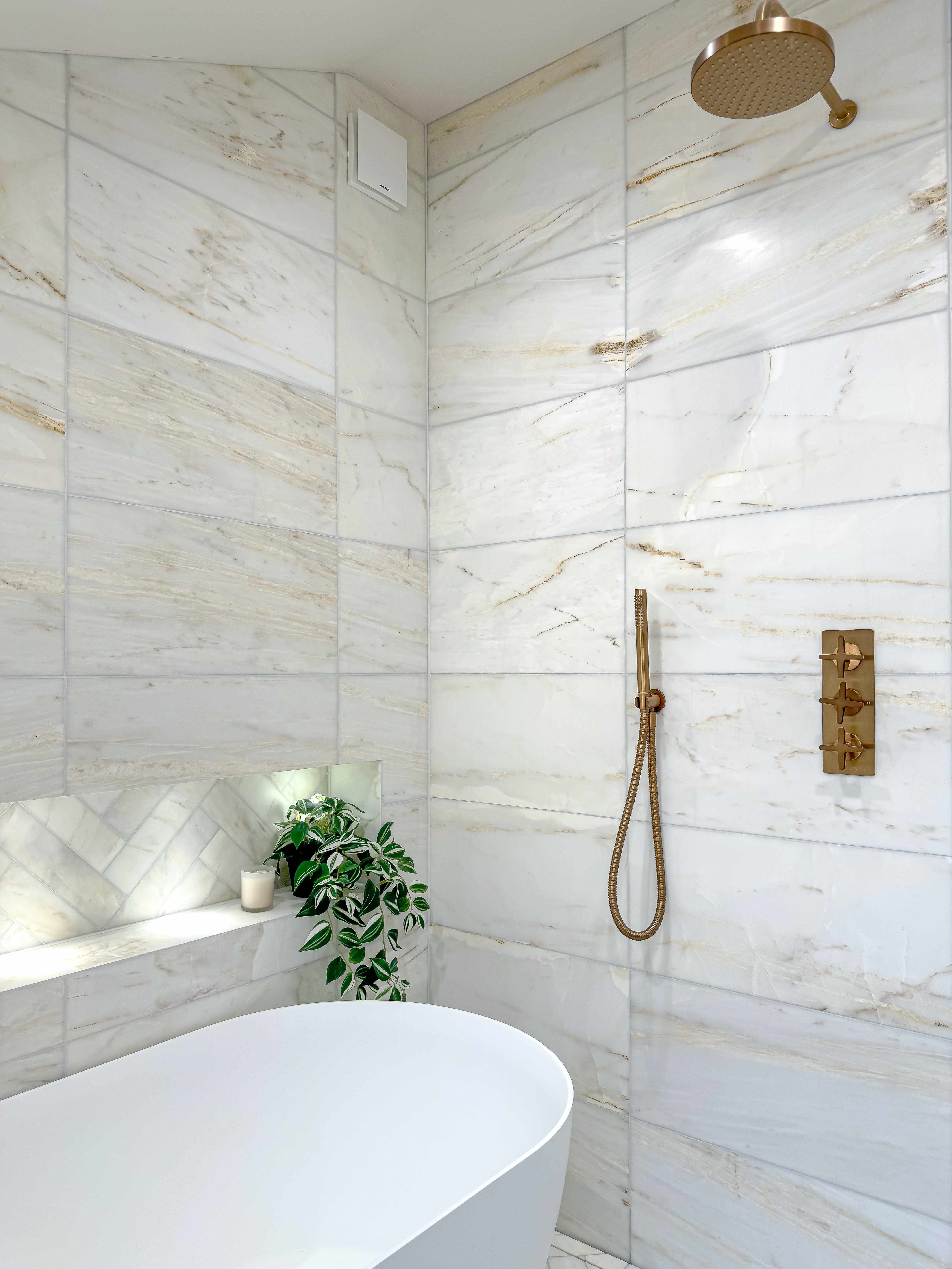 Shower area with brass fixtures